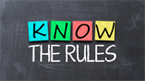 chalk board with 'know the rules' written on in colour 